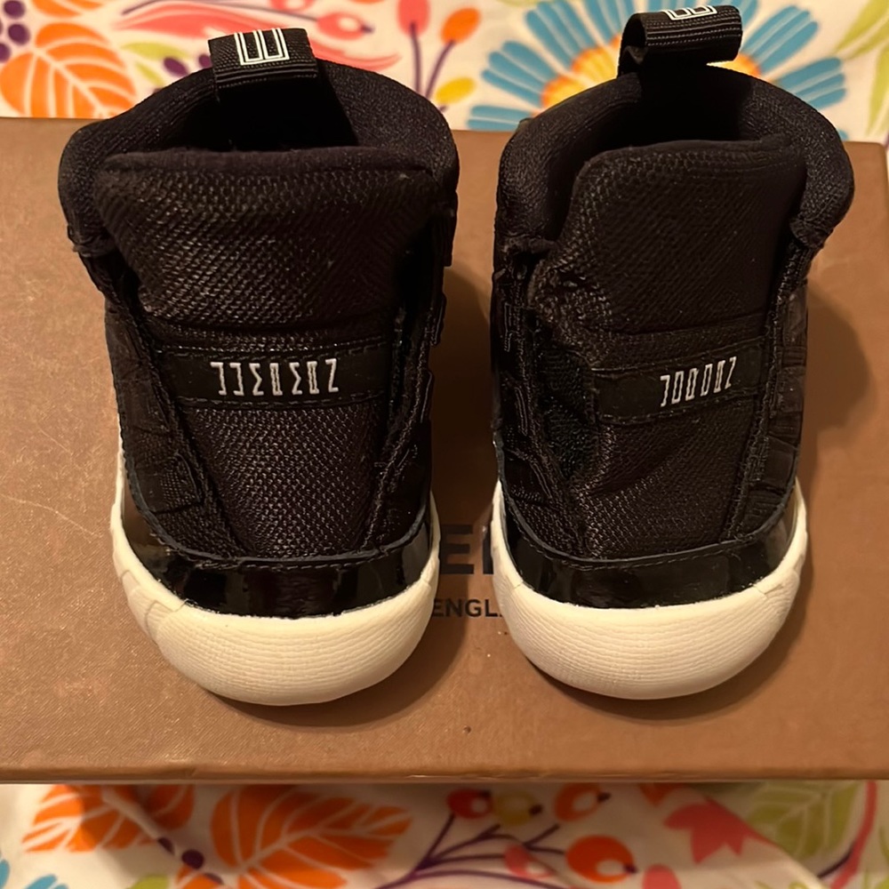 Black and red Jordan’s 11s
